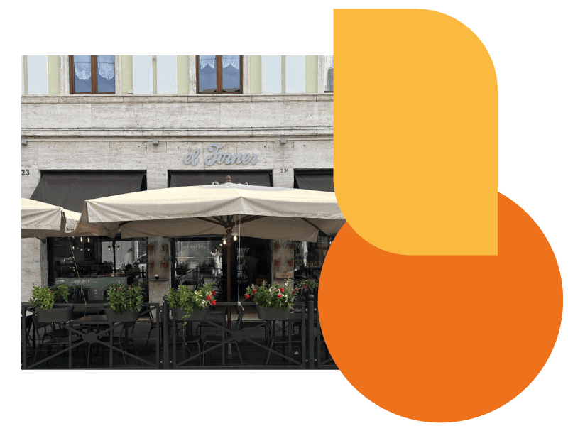 Èl Forner - vista del negozio di Corso Martiri della Libertà con tavolini esterni a Brescia